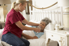 caregiver taking care of an elder